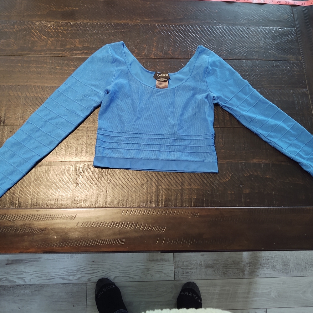 bebe long sleeve shirt very stretchy size M/L
